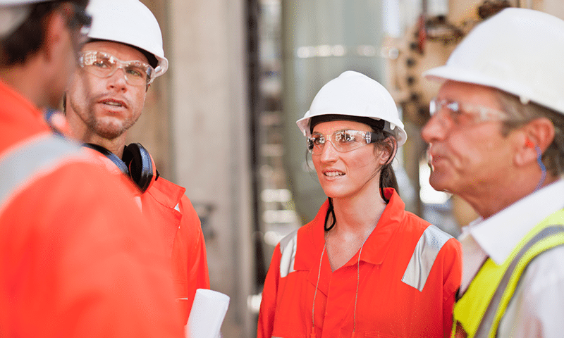 Construction workers in discussion